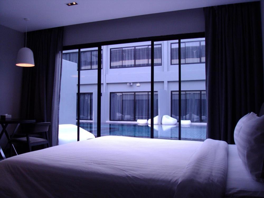 S Ratchada Leisure Hotel - Sha Plus Bangkok Eksteriør billede A bedroom at the hotel