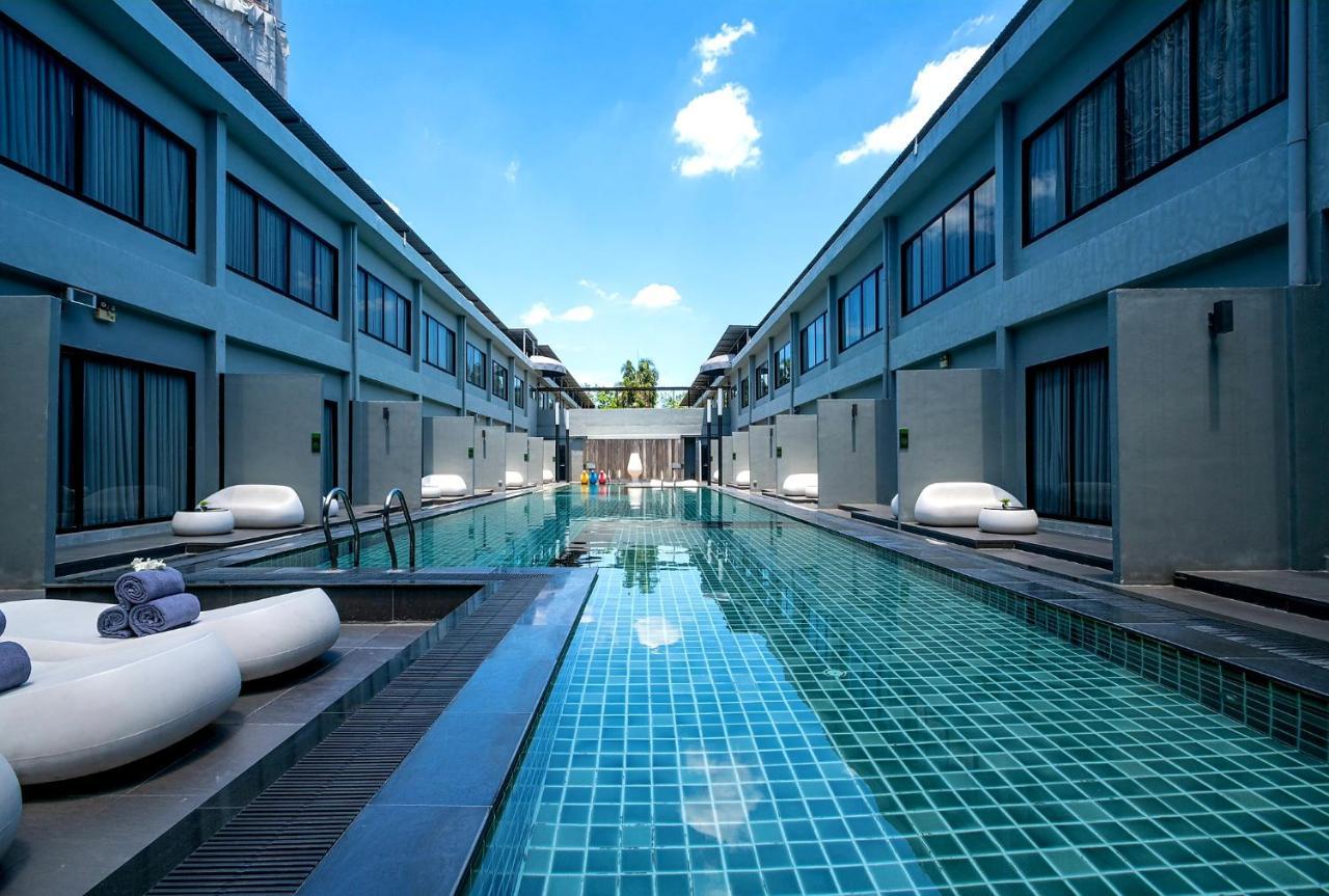 S Ratchada Leisure Hotel - Sha Plus Bangkok Eksteriør billede The swimming pool at the hotel